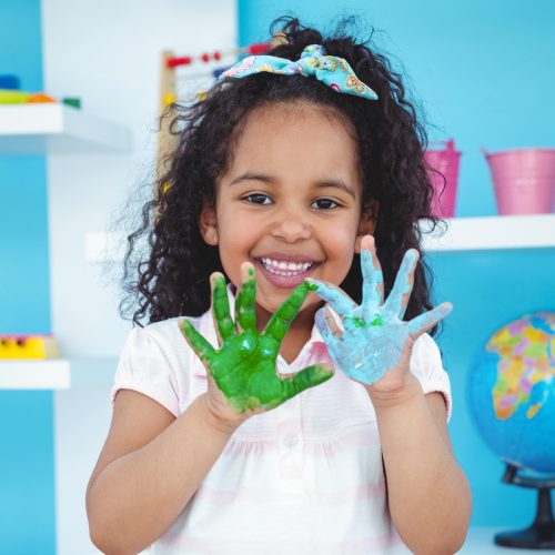 cute-girl-showing-her-paint-covered-hands (1)