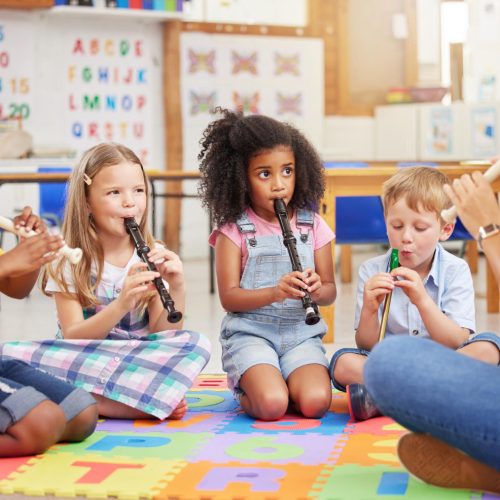 we-love-learning-about-musical-instruments-shot-children-learning-about-musical-instruments-class.jpg